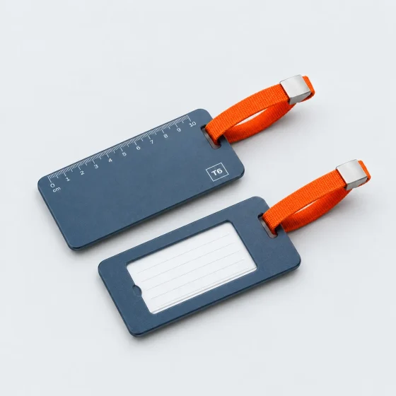 Aluminium Ruler Tag Pair, opened to show what fits inside