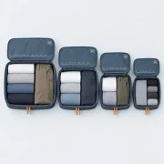 Checked Bag Five, opened to show what fits inside