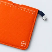 Passport Sleeve, close-up of the printed scale and size code