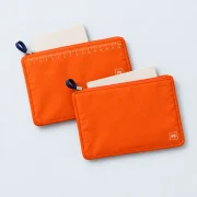 Passport Sleeve Pair, opened to show what fits inside
