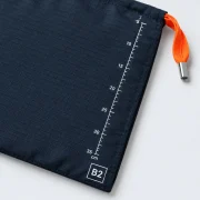Shoe Bag Duo, close-up of the printed scale and size code